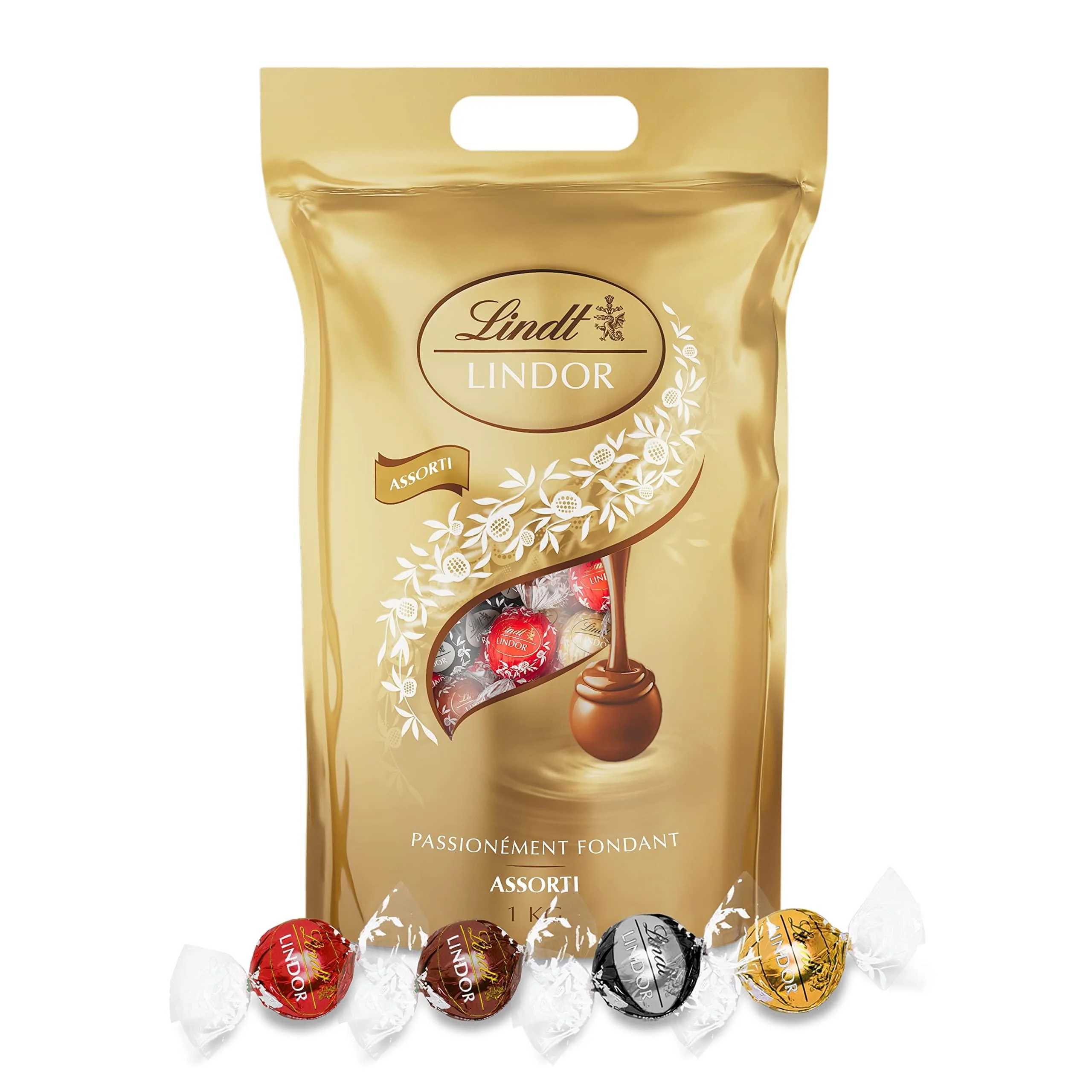 Lindt - Sachet Grand format LINDOR - Assortiment de Chocolats au Lait Noir 60% Blanc et Lait-Noisettes - C ur Fondant 1kg