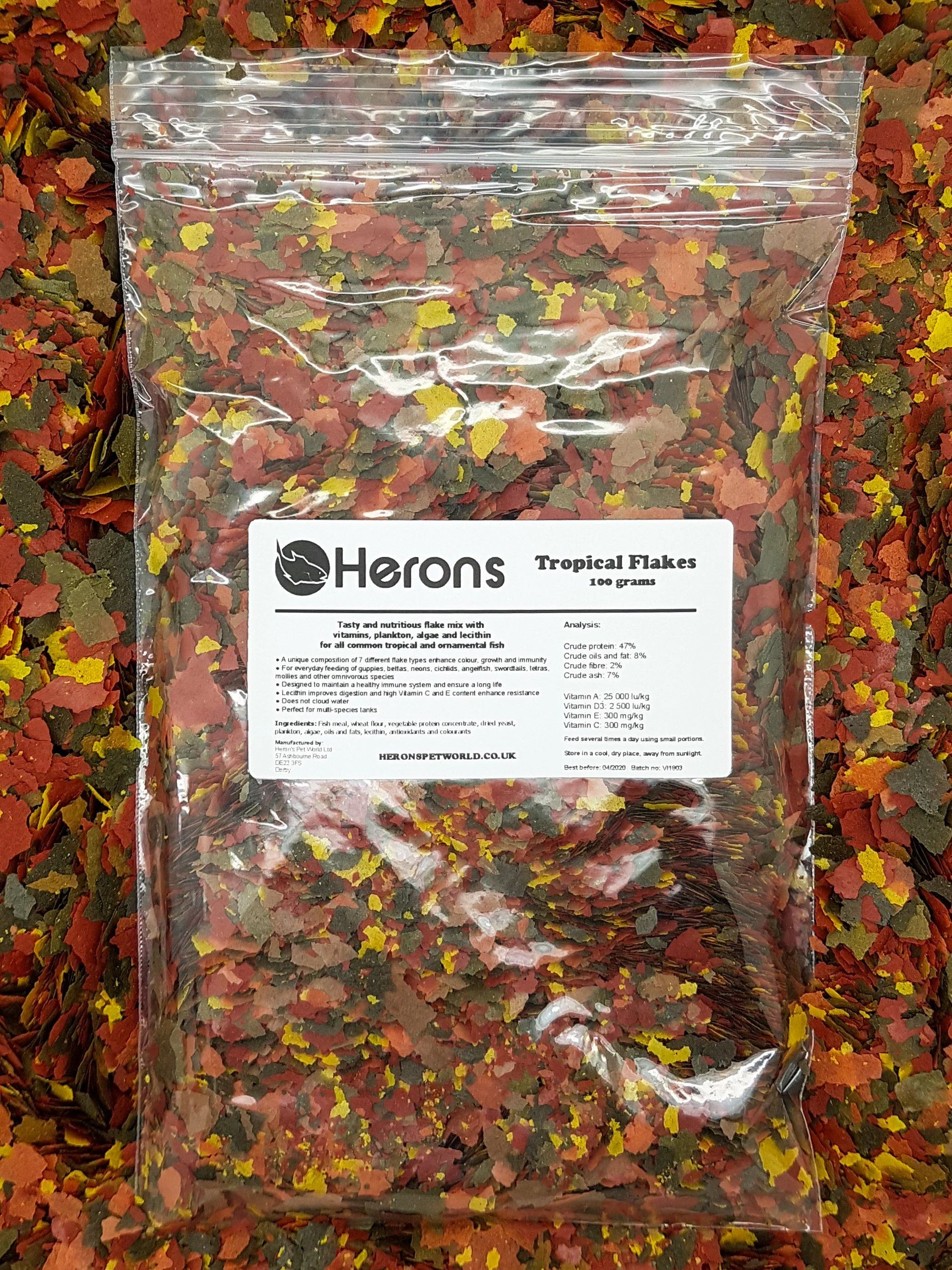HERONS - Tropical Flakes - For all Tropical Fish - Guppies Bettas Neons Cichlids Angelfish Swordtails - Multi-Nutrient Complex - Supports Growth Colouration and Immune System - 100 Grams Fish 100 g (Pack of 1)